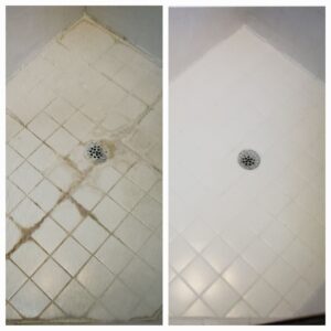 A large crowd gathers at a grand, illuminated event stage at night.